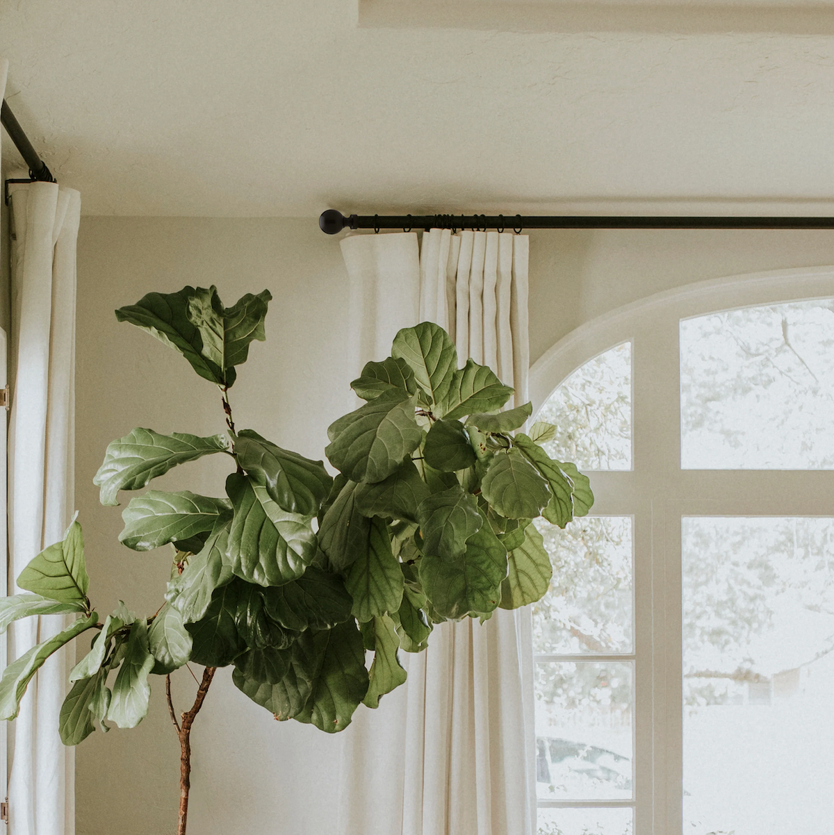 Custom Adjustable Drapery Hardware in Black With Luna Finial